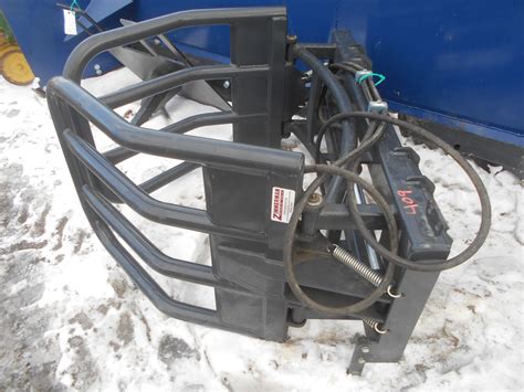 bale hugger for skid steer|skid steer bale handles.